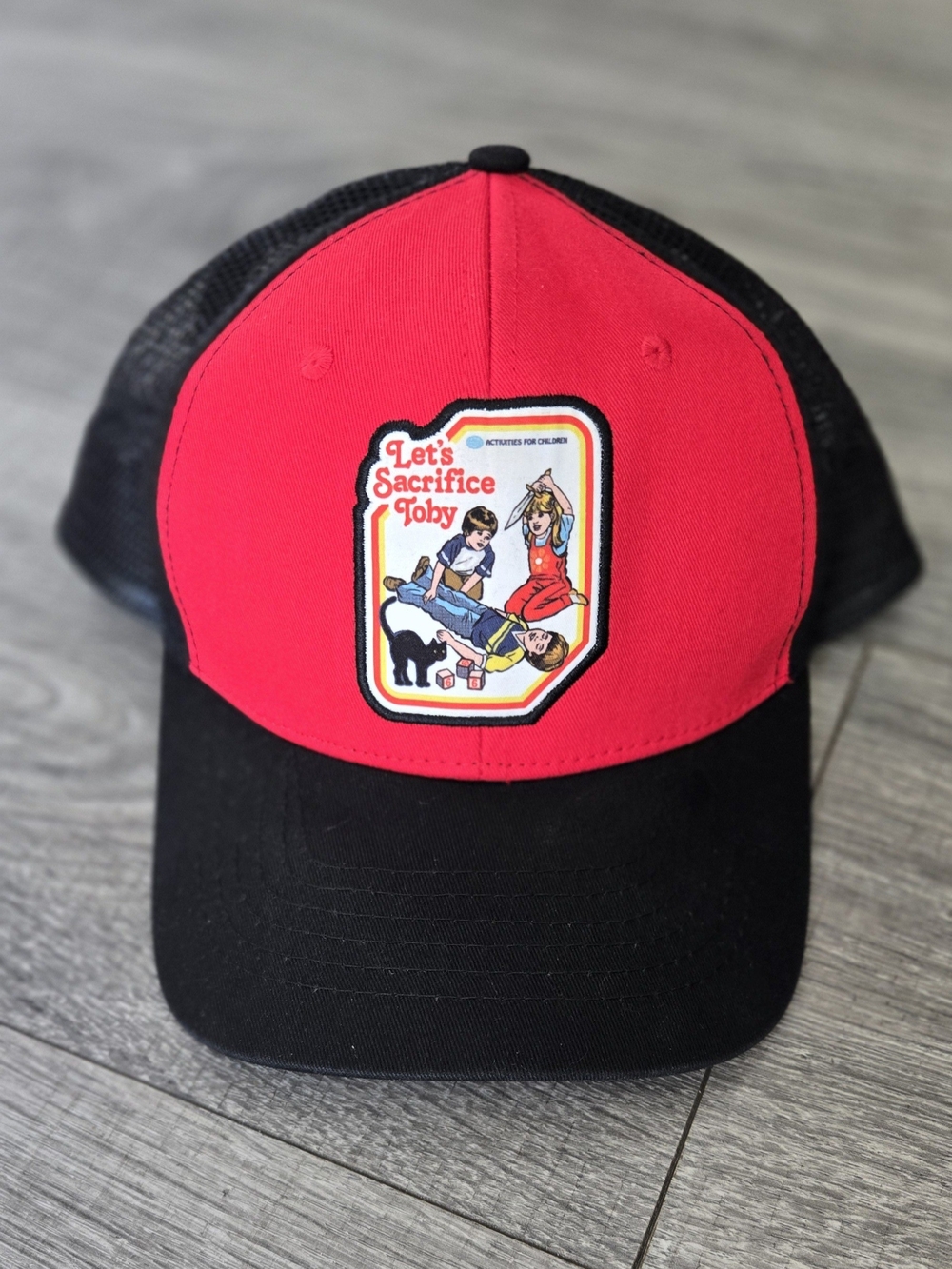 Spencer’s Steven Rhodes Let’s Sacrifice Toby Red Black Mesh Trucker Hat Snapback